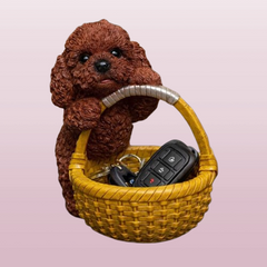 Poodle figurine in basket