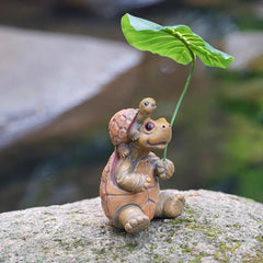 Tortoise with a leaf umbrella