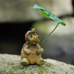 Tortoise with a leaf umbrella