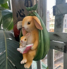 swing rabbit mother and son