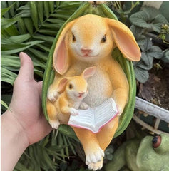 swing rabbit mother and son