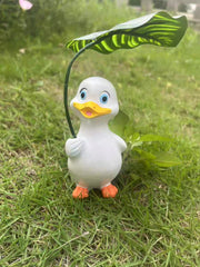 Duck holding a umbrella