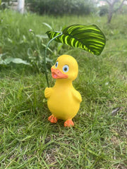 Duck holding a umbrella