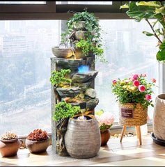 Cascading Water Fountain with LED Lights, Decorative Rock Design, Multi-Tier Plante