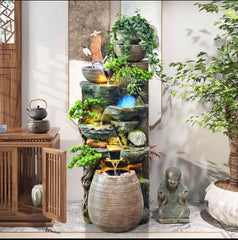 Cascading Water Fountain with LED Lights, Decorative Rock Design, Multi-Tier Plante