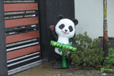 Garden panda statue with bamboo