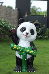 Garden panda statue with bamboo
