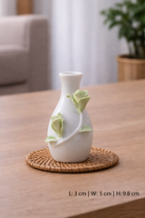 vase with green rosebuds
