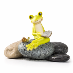 Frog figurine with snail