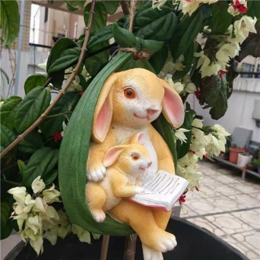 swing rabbit mother and son