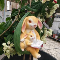 swing rabbit mother and son