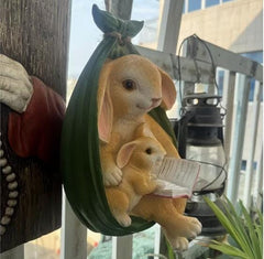 swing rabbit mother and son