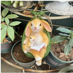 swing rabbit mother and son